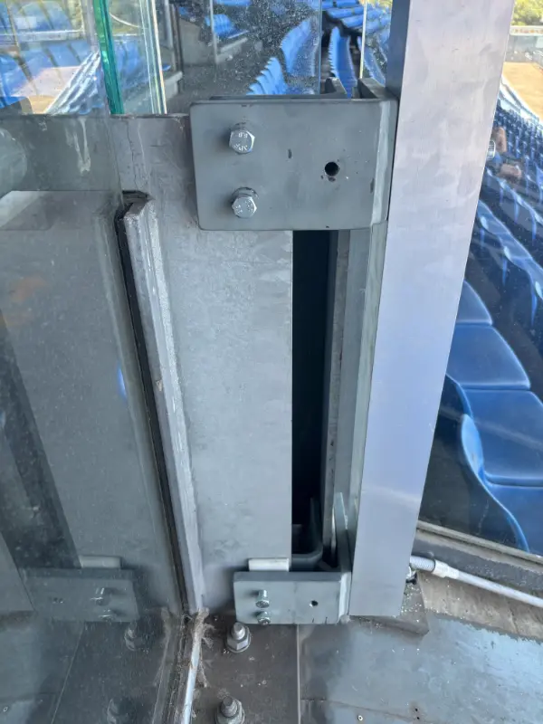 Custom-fabricated-brackets-designed-to-clamp-onto-existing-balustrade-components-and-mount-6m-collapsible-pole-Cantebury